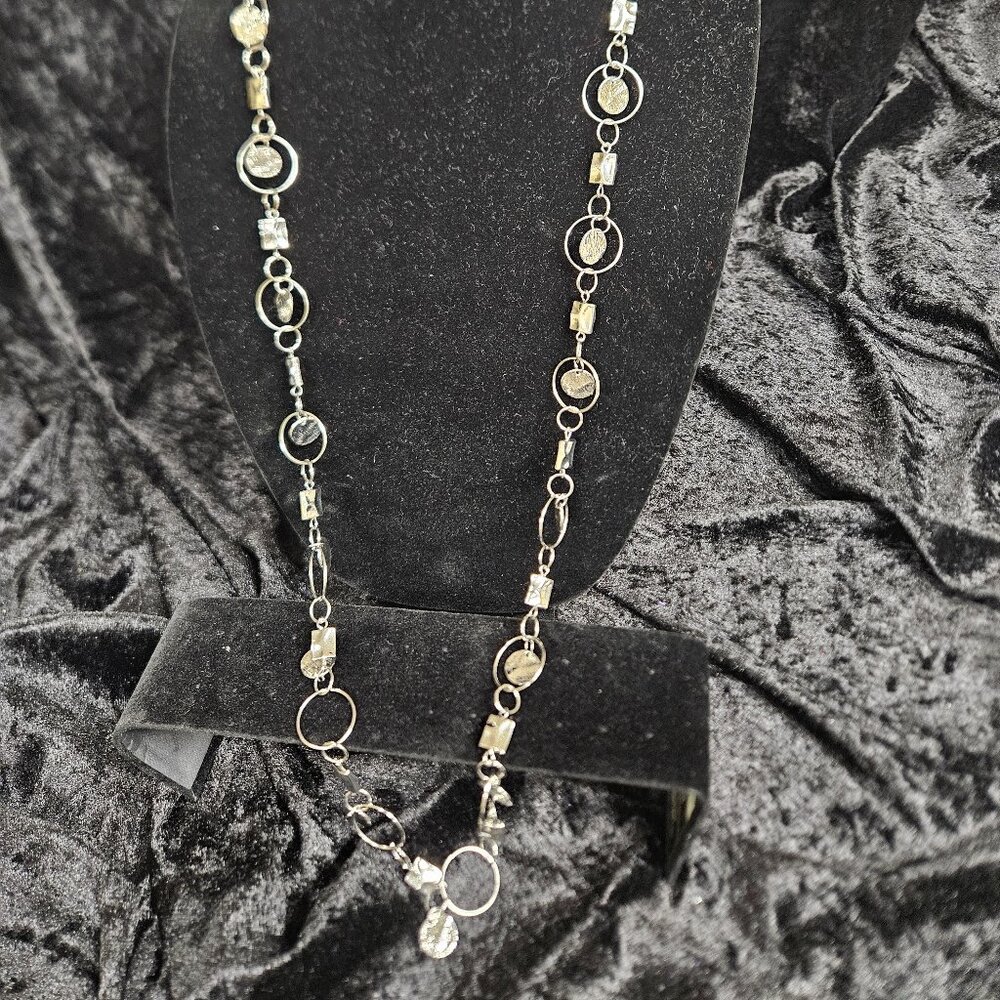 Silver toned necklace with varying circle/square accents - 17"